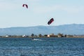 People practicing kite Surfing in Platja del Trabucador in the Delta del Ebro, Tarragona, Spain in summer 2020