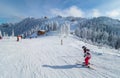 People practicing ski in Poiana Brasov, Romania