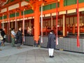 People pray at Fushimi inari shrine