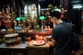 People pray indoor of ancient temple