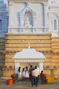 People pray at the Ruwanwelisaya stupa in Anuradhapura, Sri Lanka.