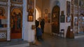People pray in temple of russian orthodox church