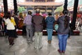 People praying at Chungshan temple in Taipei, Taiwan