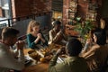 People Praying at Dinner Party