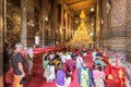 People praying inside buddhist temple