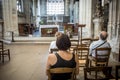 People praying inside a church Royalty Free Stock Photo