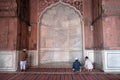 People praying at the Jama Masjid Mosque, Delhi Royalty Free Stock Photo