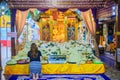 People praying with jasmine flower at Wat Phra That Doi Kham (often referred to as Wat Doi Kham or the Golden temple) is located