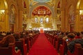 People praying in the memorial cathedral