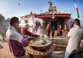 People praying near Bodnath stupa Royalty Free Stock Photo