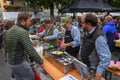 People during the preparation of traditional melted cheese at Engelberg on the Swiss alps