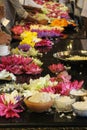 People prepare the offering in front of the relic of Temple of t