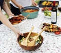 People preparing food for party