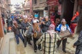 People on a procession for a Hindu sacrifice at Bhaktapur in Nepal