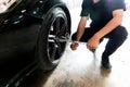 People Professional mechanic Will change tire. Royalty Free Stock Photo