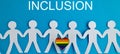 People protecting inclusion text and LGBT flag