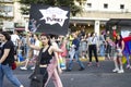 People with protest signs in preparation to the annual LGBTQ pride parade