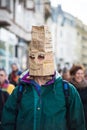 people protesting against the sanitary dictatorship with paper bag on head