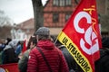 people protesting in thee street with CGT syndicate flags