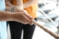 People pulling rope together, closeup of hands Royalty Free Stock Photo