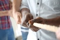 People pulling rope together, closeup of hands Royalty Free Stock Photo