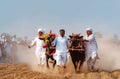 People of Punjab village in white clothing in Bull Karah race - rural event in Pakistan