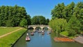 People in Punts Punting on the river Cam at Cambridge. Royalty Free Stock Photo