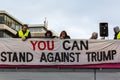 People put up anti Donald Trump banner.