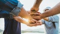 People putting their hands together. Friends with a stack of hands showing unity and teamwork. Friendship happiness leisure Royalty Free Stock Photo