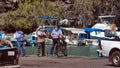 People on the quay in front of fishing boats in the marina Royalty Free Stock Photo