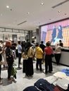 Yogyakarta, Indonesia - April 18th 2023: People queue on clothing store