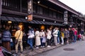 People queue to buy famous Hida beef Sushi in Takayama old town, Japan Royalty Free Stock Photo