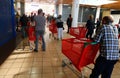 People queue to enter a supermarket during the COVID-19 outbreak in the Spanish island of Mallorca