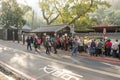 People queueing in front of public bath house at early morning. Royalty Free Stock Photo