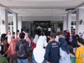People queuing for covid 19 vaccine in Indonesia to carry out goverment programs