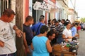 People queuing for a pizza