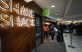 People queuing at Shake Shack in JFK airport, New York Royalty Free Stock Photo