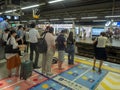 People queuing at Shinagawa station in Tokyo, Japan