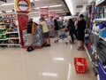 People queuing for toilet paper in supermarket