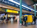 People in train terminal at Schiphol Amsterdam Airport, Holland