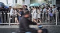 People in rain in beijing wudaokou station Royalty Free Stock Photo