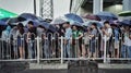 People in rain in beijing Royalty Free Stock Photo