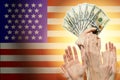 People raising hands with dollars and American flag on background. Patriotic concept Royalty Free Stock Photo