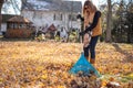 People raking leaves