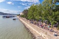 People recreating at boulevard along Danubu waterside in Budapest