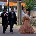 People reenacting early 20th century people