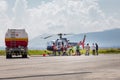 People refueling helicopter. Royalty Free Stock Photo