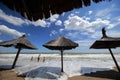 People relax on the beach at the sea