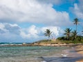 People relax on a beautiful beach in San Juan, Puerto Rico, on a warm and sunny day