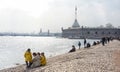 People relax on the Neva River